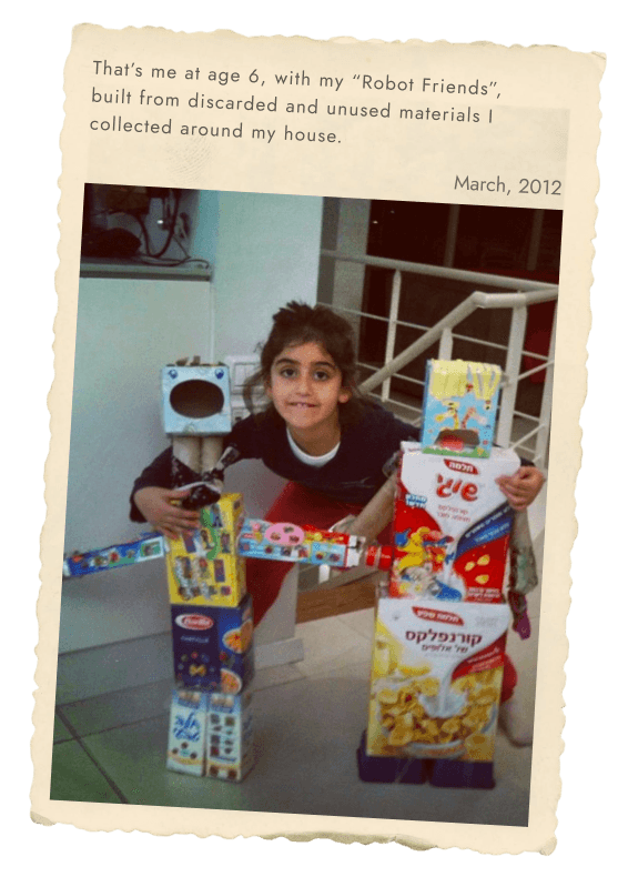 Neta at age six with her Robot Friends, built from discarded materials collected around the house. March, 2012.